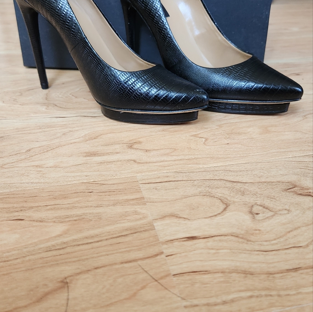 Ann Taylpr black high heels.  Sligh platform. Size 7.  Worn once.